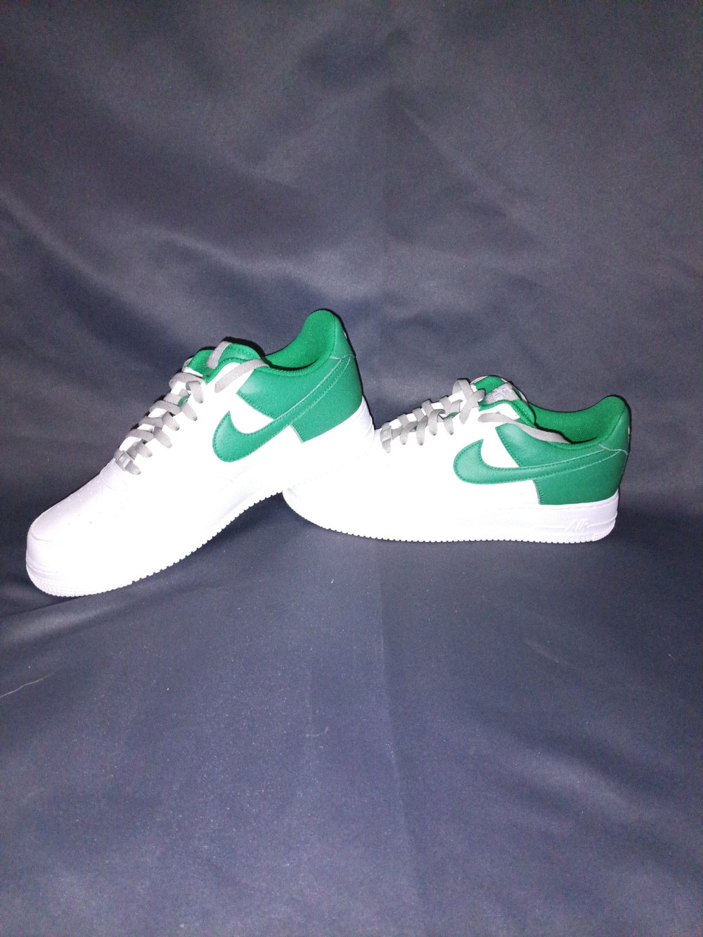 Nike White Sneakers with Green Swoosh and Heel
